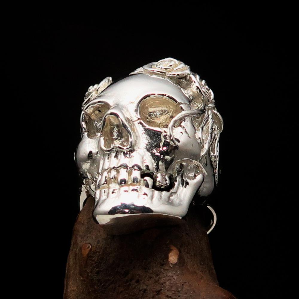 A beautifully crafted Lady's Biker Granny Skull Ring made of solid sterling silver with a mirror-polished finish, showcasing intricate skull details.