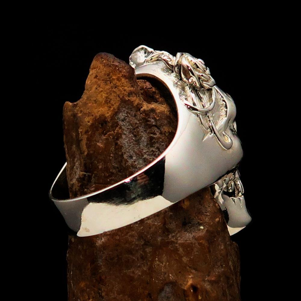 A beautifully crafted Lady's Biker Granny Skull Ring made of solid sterling silver with a mirror-polished finish, showcasing intricate skull details.