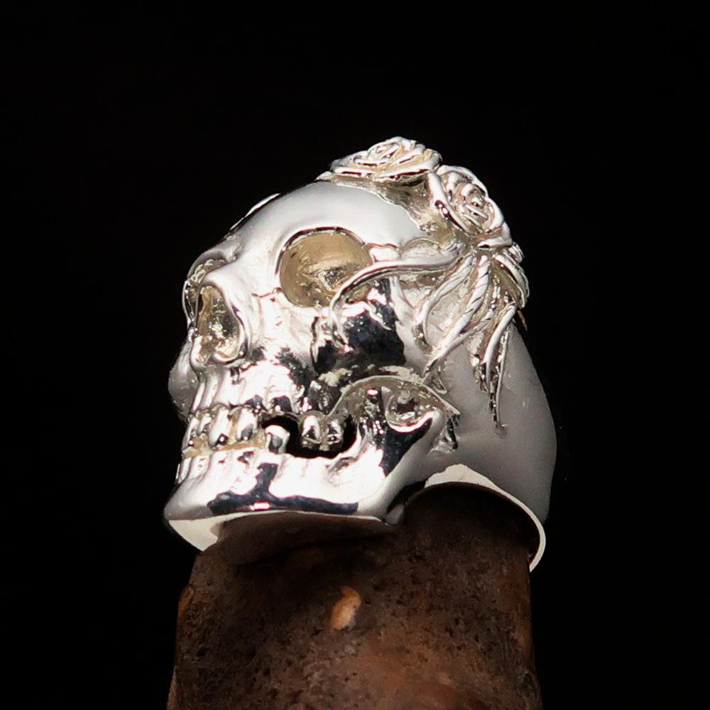 A beautifully crafted Lady's Biker Granny Skull Ring made of solid sterling silver with a mirror-polished finish, showcasing intricate skull details.