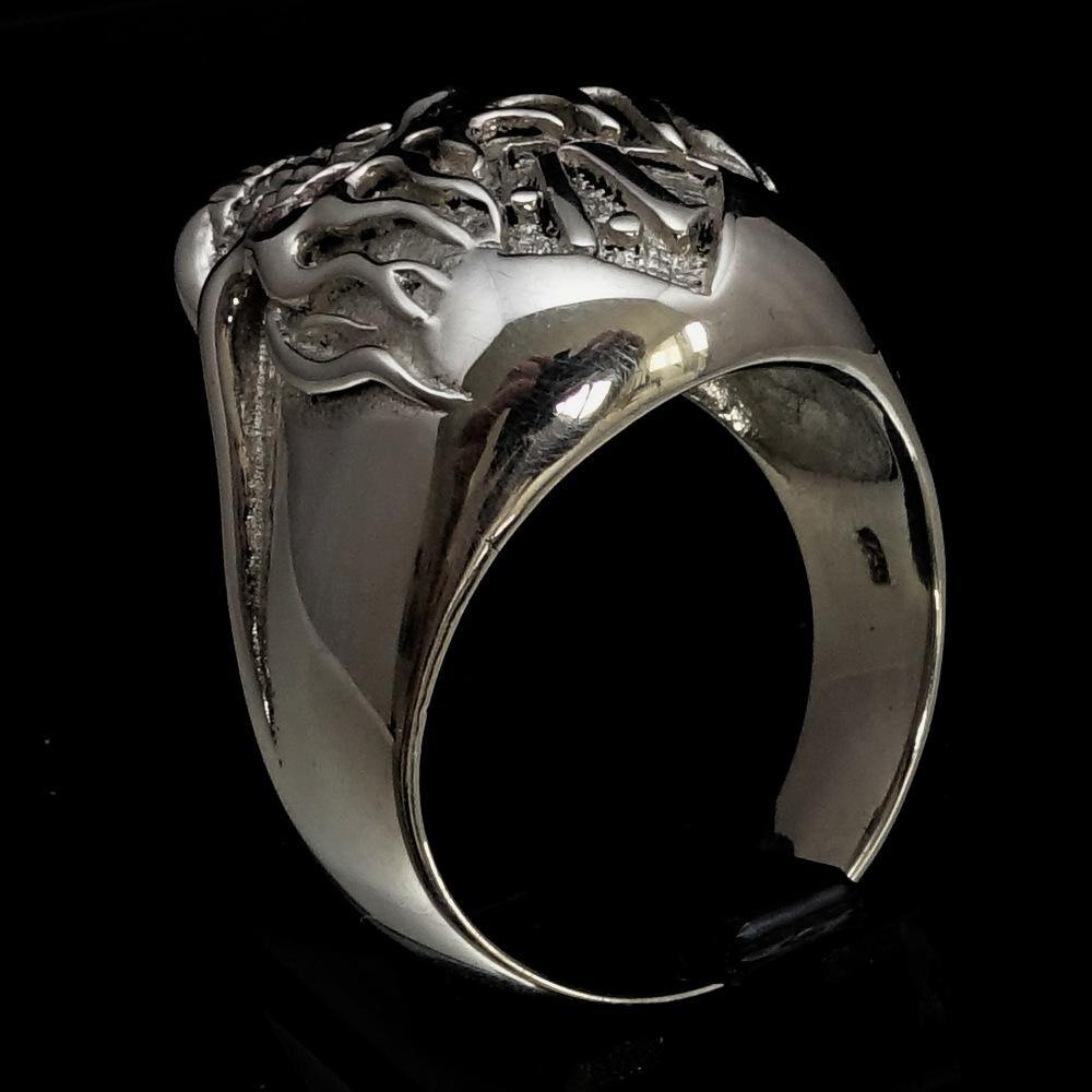 Men's 1% Flaming Skull Outlaw Ring made of solid sterling silver with red cubic zirconia eyes, showcasing a polished finish and detailed skull design.