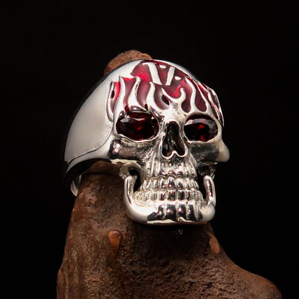 Men's 1% Flaming Skull Outlaw Ring featuring red CZ eyes, crafted from solid sterling silver with a polished finish.