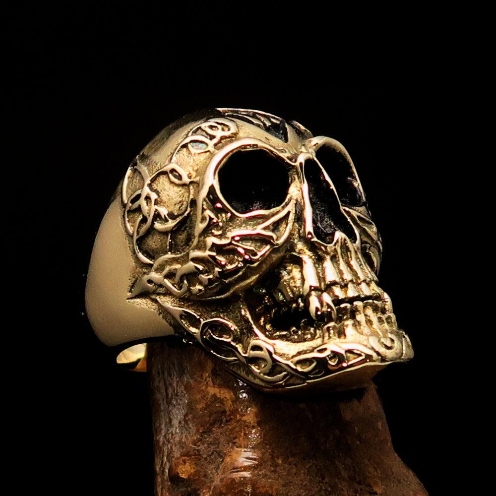 Men's 1% Runes Skull Outlaw Biker Ring made of solid brass with an antiqued finish, showcasing intricate skull and rune designs.