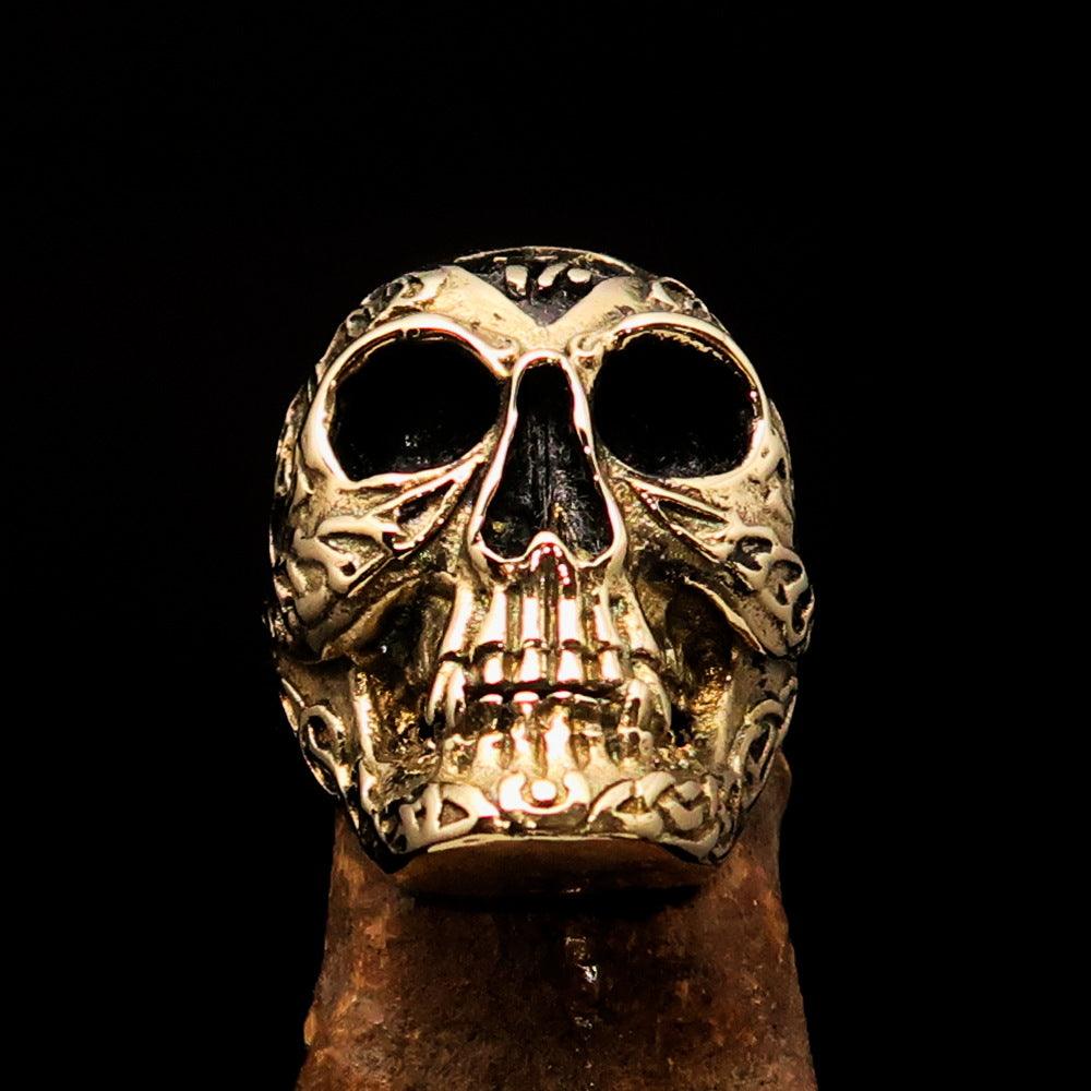 Men's 1% Runes Skull Outlaw Biker Ring made of solid brass with an antiqued finish, showcasing intricate skull and rune designs.