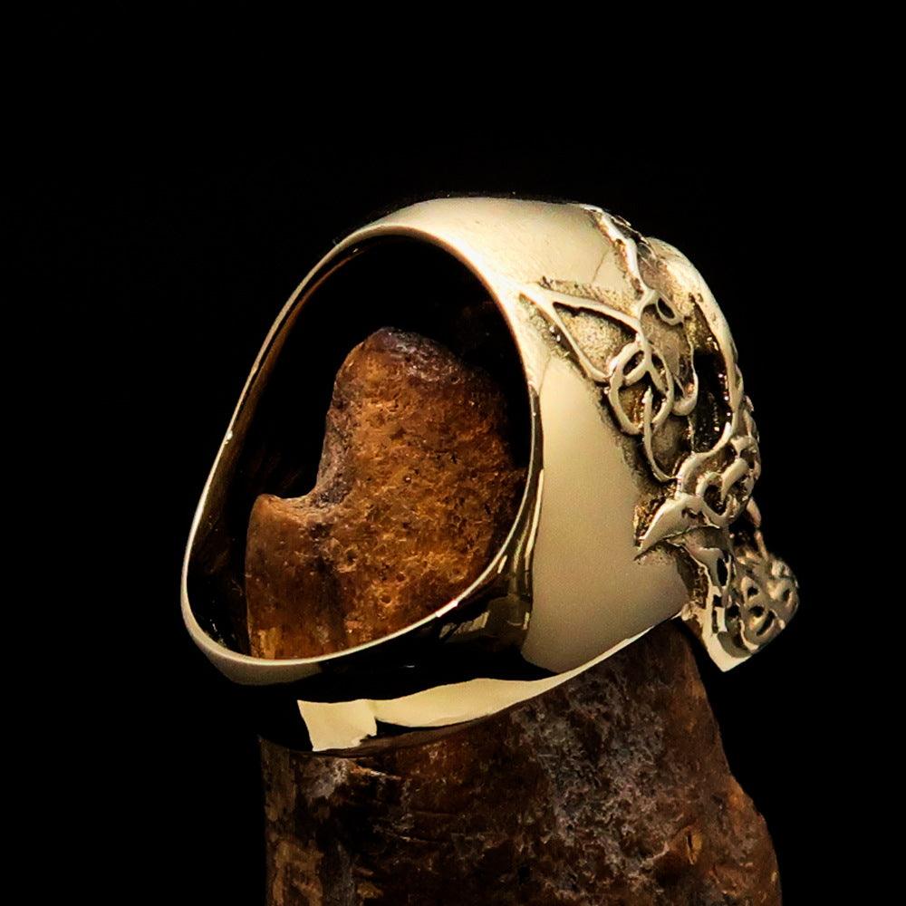 Men's 1% Runes Skull Outlaw Biker Ring made of solid brass with an antiqued finish, showcasing intricate skull and rune designs.