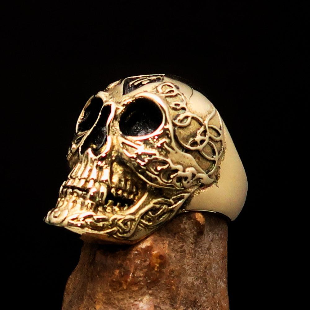 Men's 1% Runes Skull Outlaw Biker Ring made of solid brass with an antiqued finish, showcasing intricate skull and rune designs.