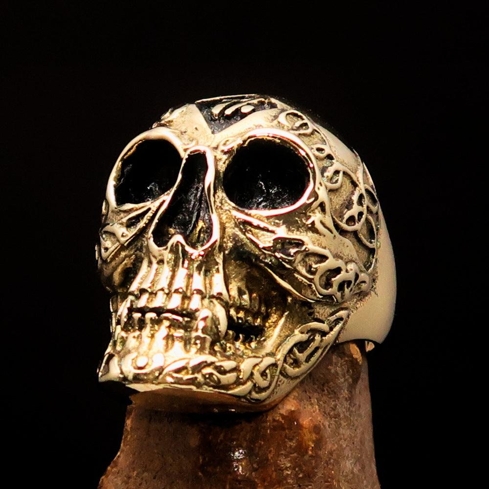 Men's 1% Runes Skull Outlaw Biker Ring made of solid brass with an antiqued finish, showcasing intricate skull and rune designs.