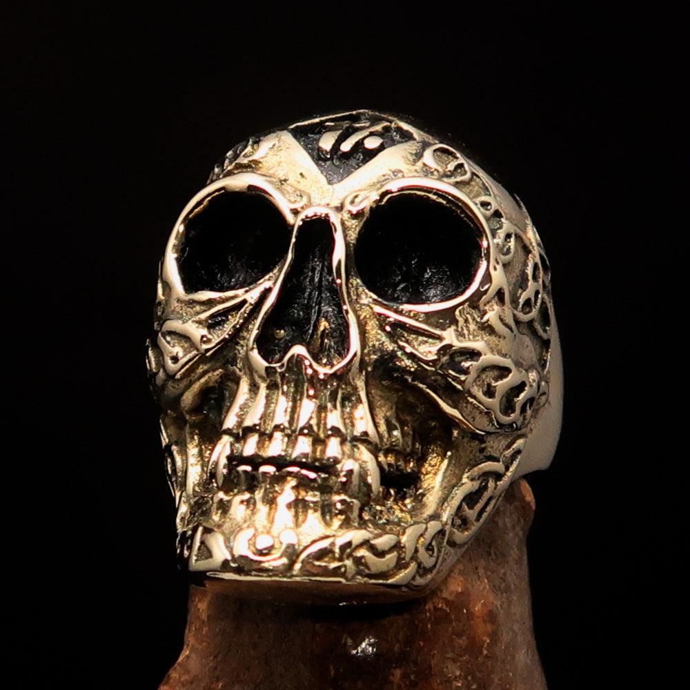 Men's 1% Runes Skull Outlaw Biker Ring made of solid brass with an antiqued finish, showcasing intricate skull and rune designs.