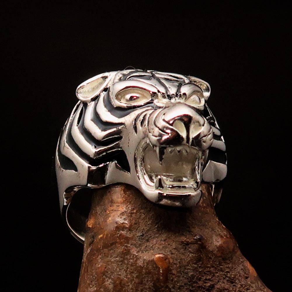 A beautifully crafted sterling silver men's ring featuring a black enamel male tiger design, showcasing intricate details and a polished finish.