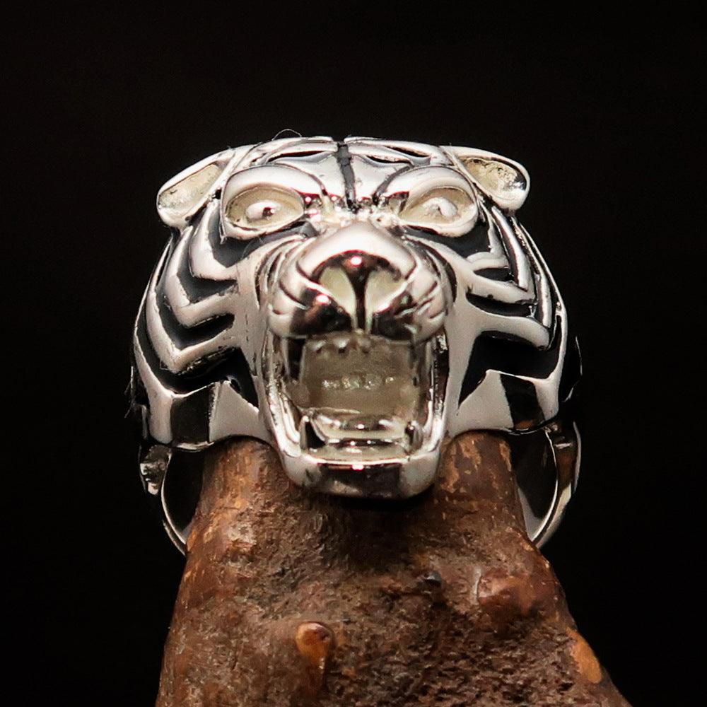 A beautifully crafted sterling silver men's ring featuring a black enamel male tiger design, showcasing intricate details and a polished finish.