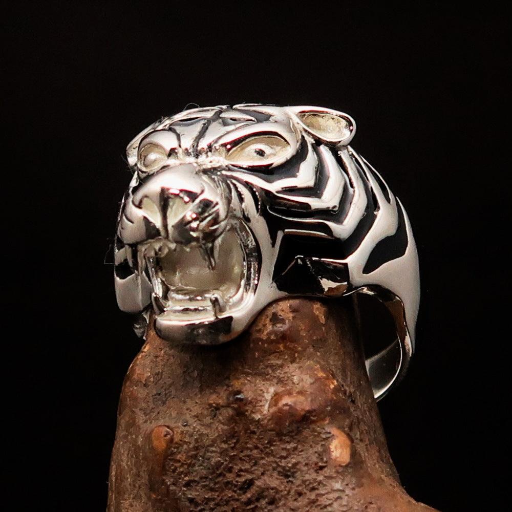 A beautifully crafted sterling silver men's ring featuring a black enamel male tiger design, showcasing intricate details and a polished finish.