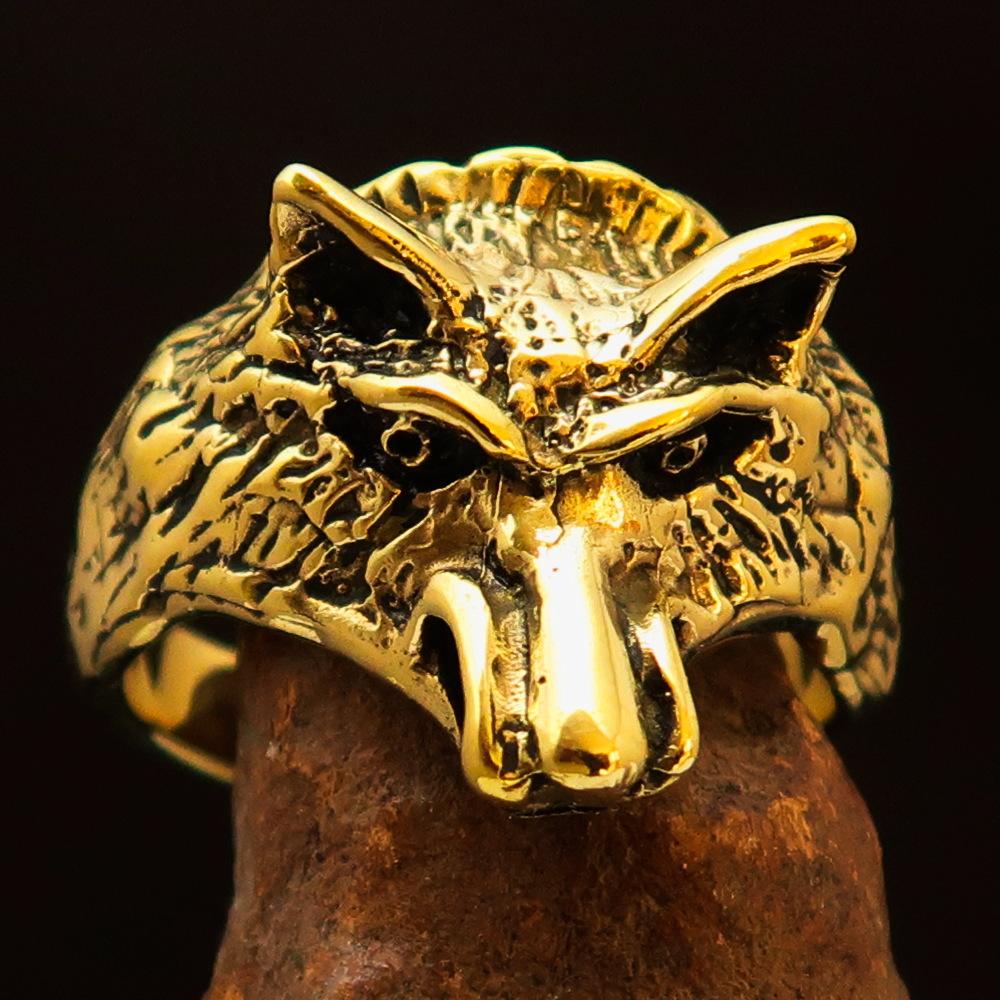 Men's Animal Ring featuring an intricately designed coyote in antiqued brass, showcasing quality craftsmanship and unique style.