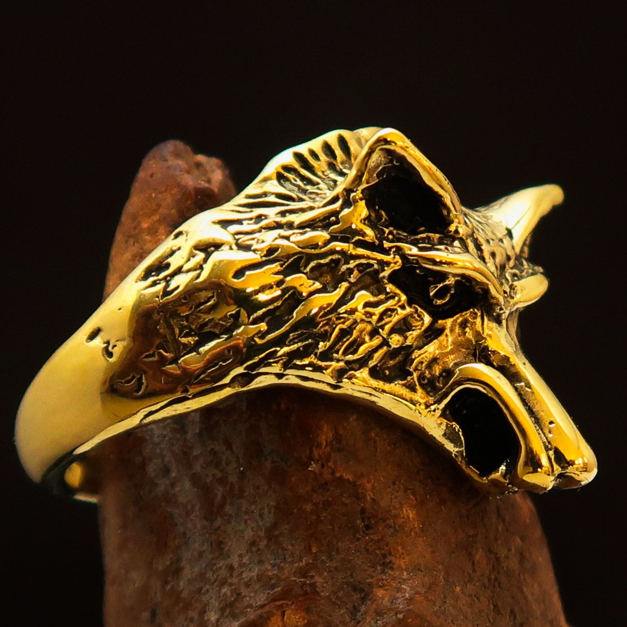 Men's Animal Ring featuring an intricately designed coyote in antiqued brass, showcasing quality craftsmanship and unique style.