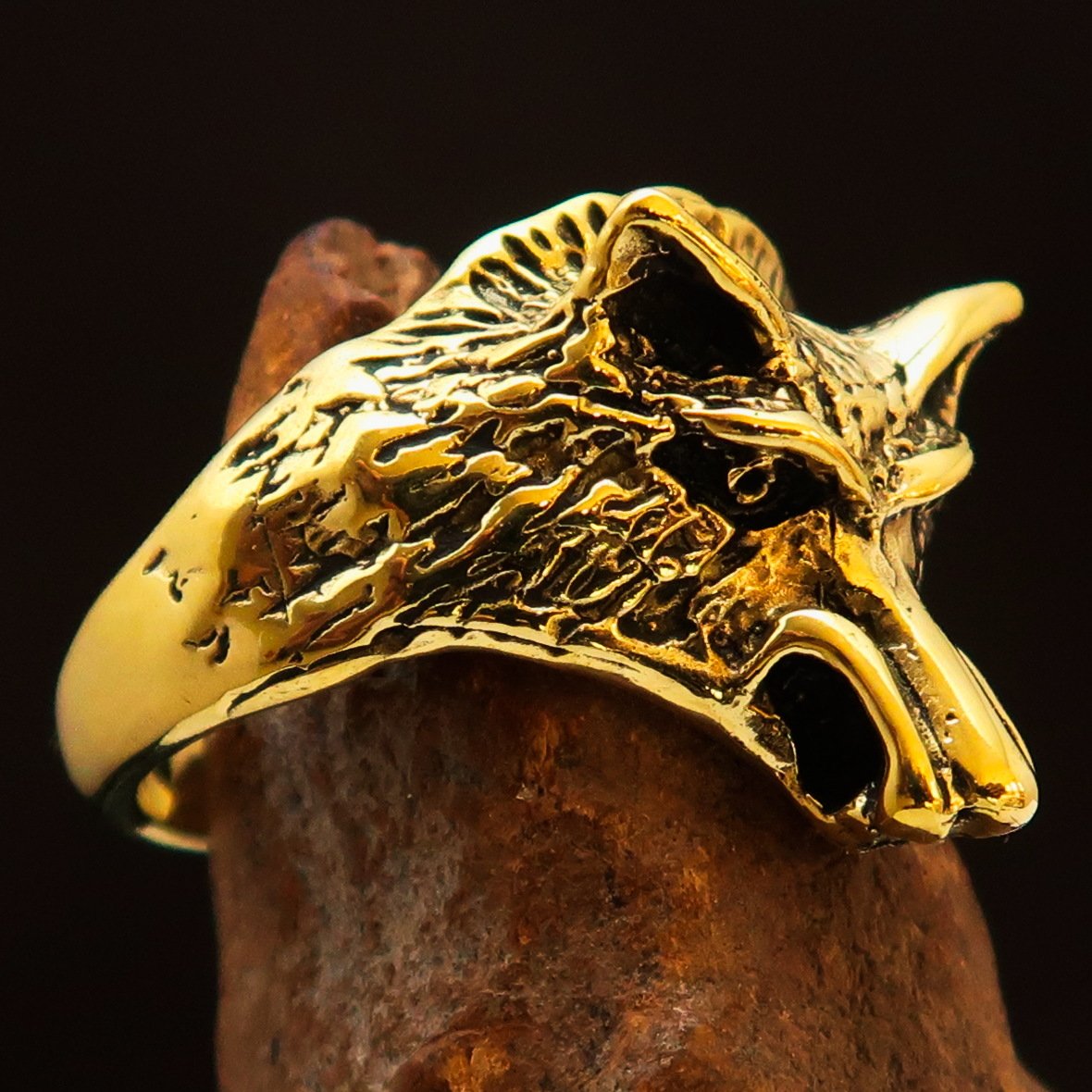 Men's Animal Ring featuring an intricately designed coyote in antiqued brass, showcasing quality craftsmanship and unique style.