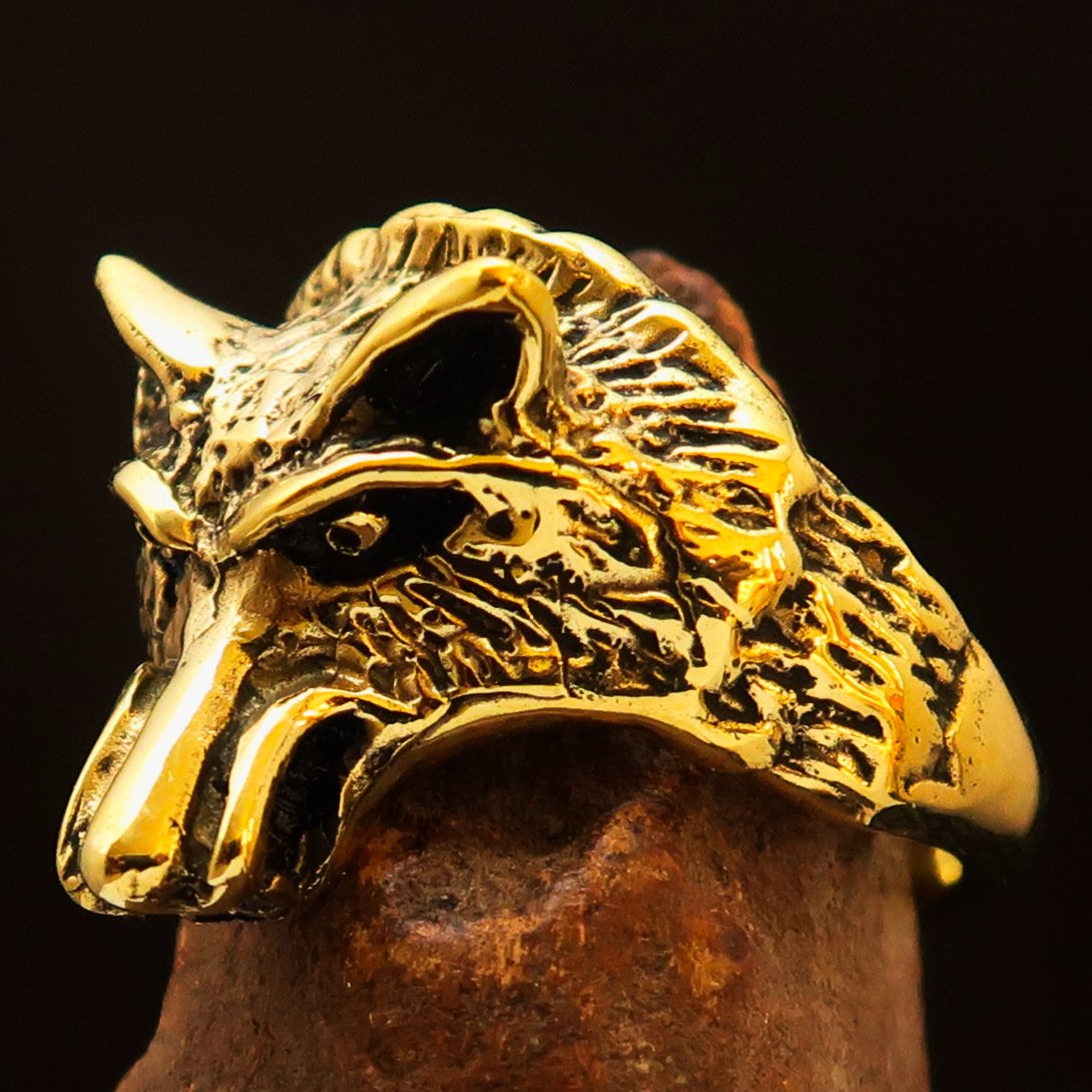 Men's Animal Ring featuring an intricately designed coyote in antiqued brass, showcasing quality craftsmanship and unique style.