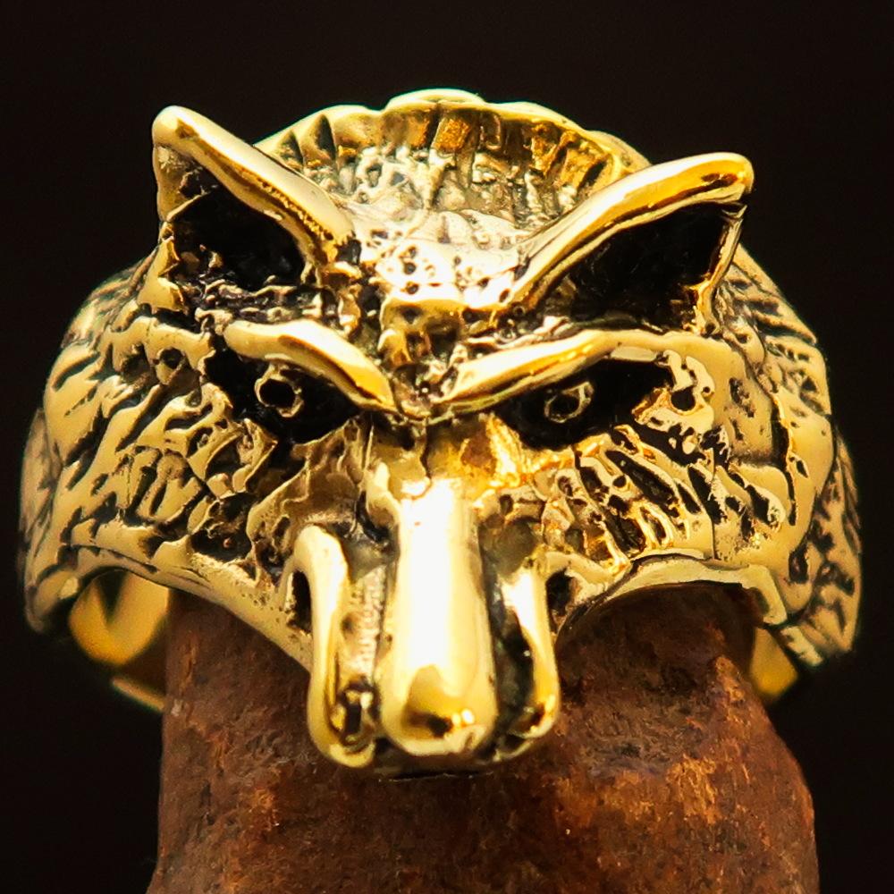 Men's Animal Ring featuring an intricately designed coyote in antiqued brass, showcasing quality craftsmanship and unique style.