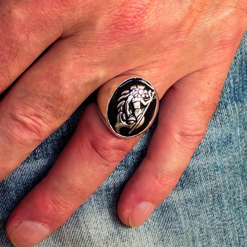 Men's Aquarius Ring in solid sterling silver with black enamel, showcasing a polished finish and astrological design.