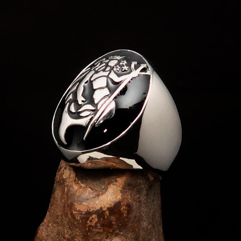 Men's Aquarius Ring in solid sterling silver with black enamel, showcasing a polished finish and astrological design.