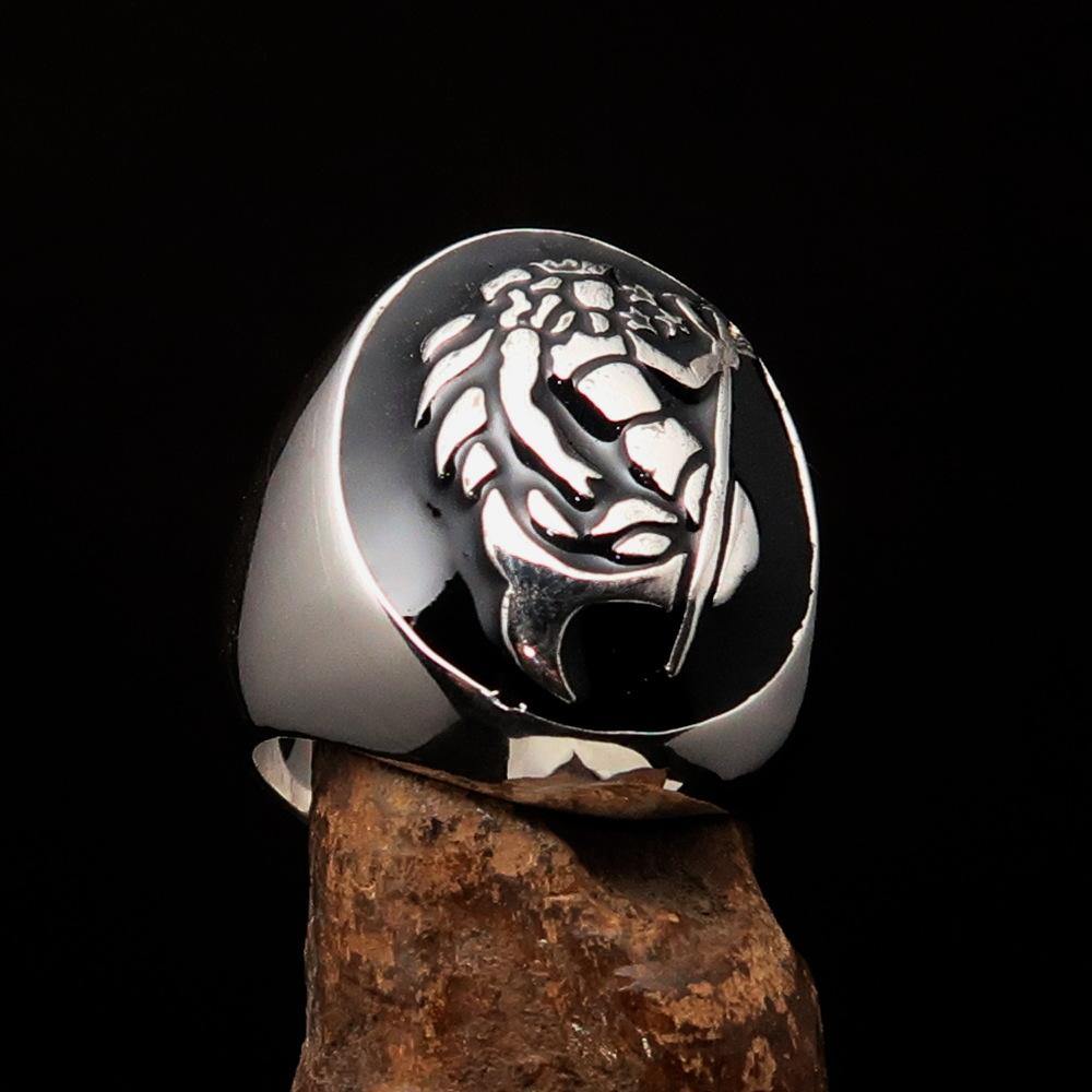 Men's Aquarius Ring in solid sterling silver with black enamel, showcasing a polished finish and astrological design.