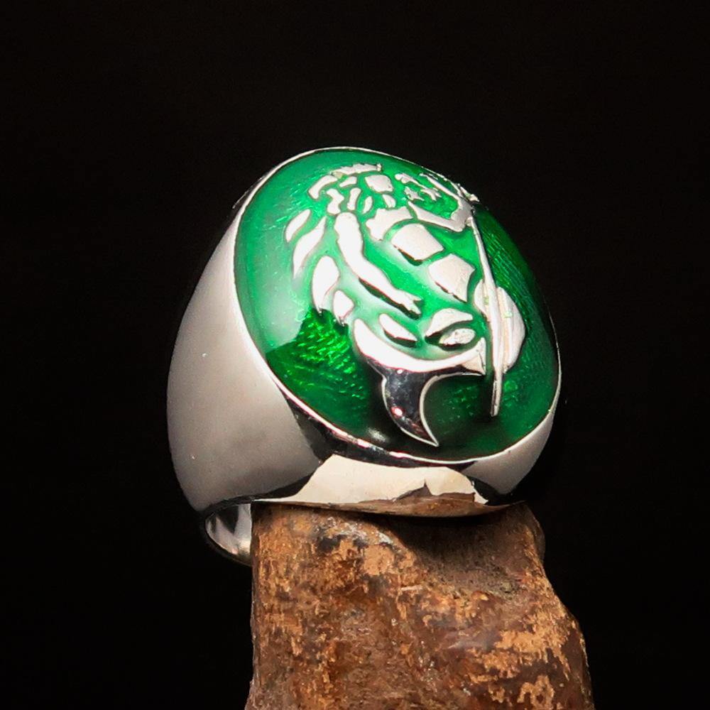 Men's Aquarius Ring in sterling silver with green enamel, showcasing a polished finish and astrological design.