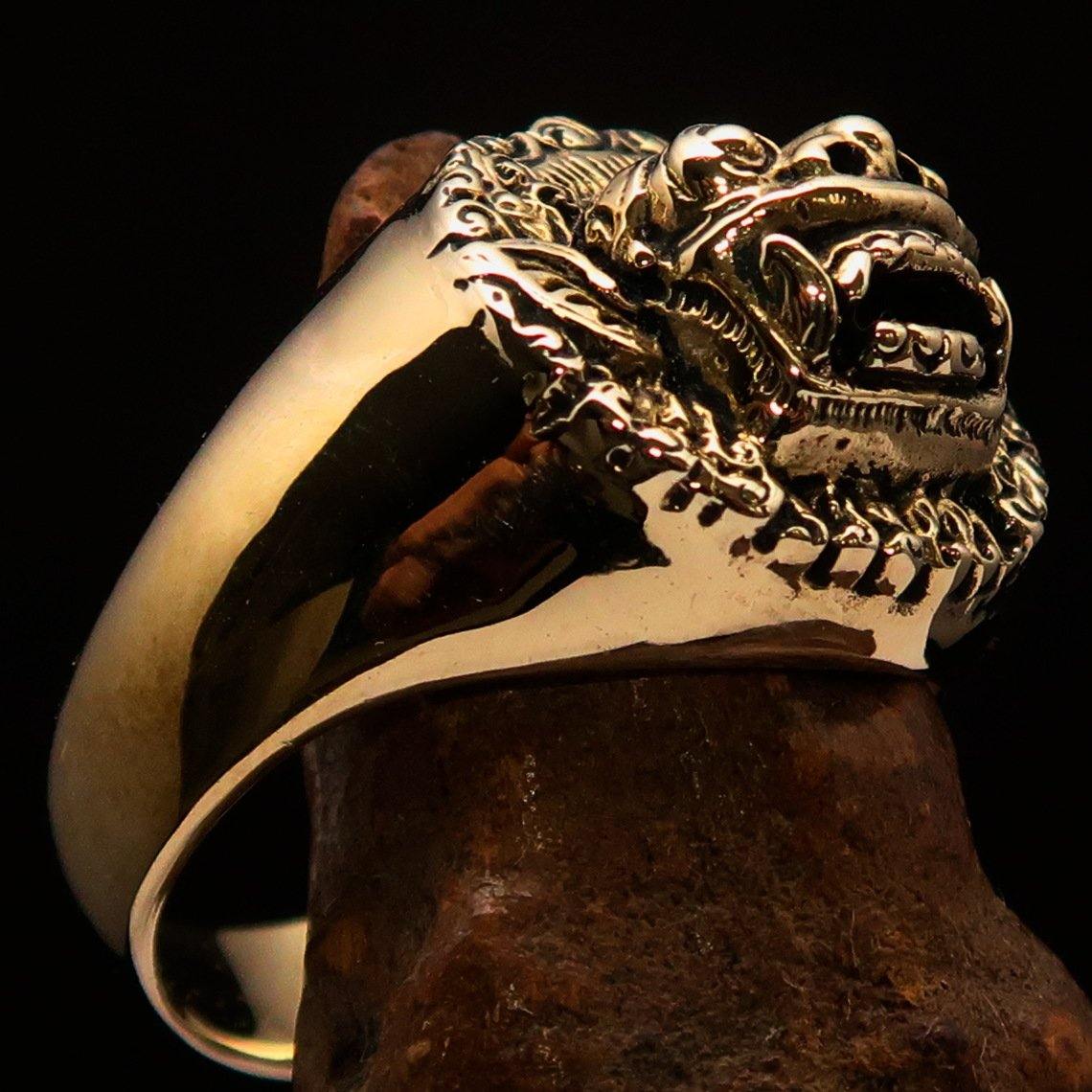 Men's Balinese God Ring made of solid brass with an antiqued and polished finish, featuring intricate Barong design.