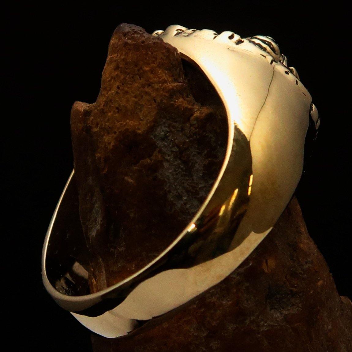 Men's Balinese God Ring made of solid brass with an antiqued and polished finish, featuring intricate Barong design.