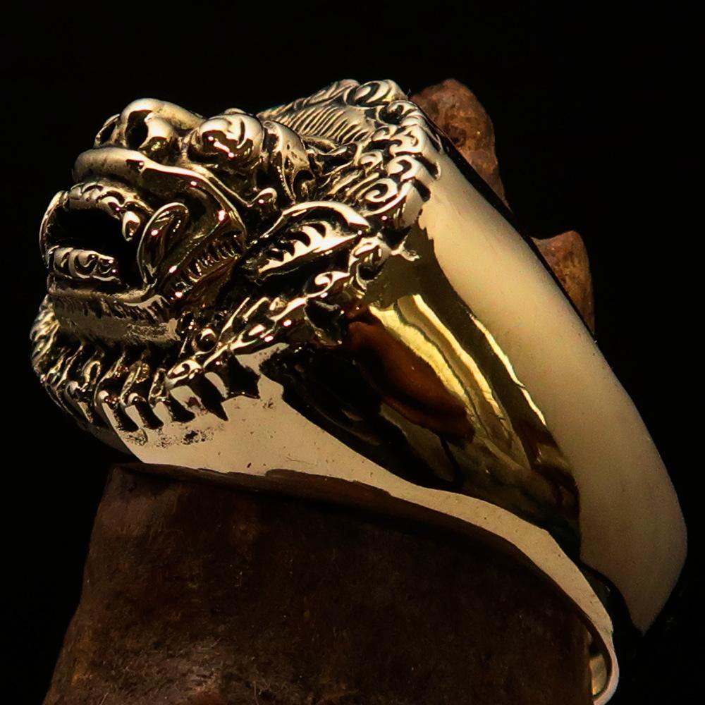 Men's Balinese God Ring made of solid brass with an antiqued and polished finish, featuring intricate Barong design.