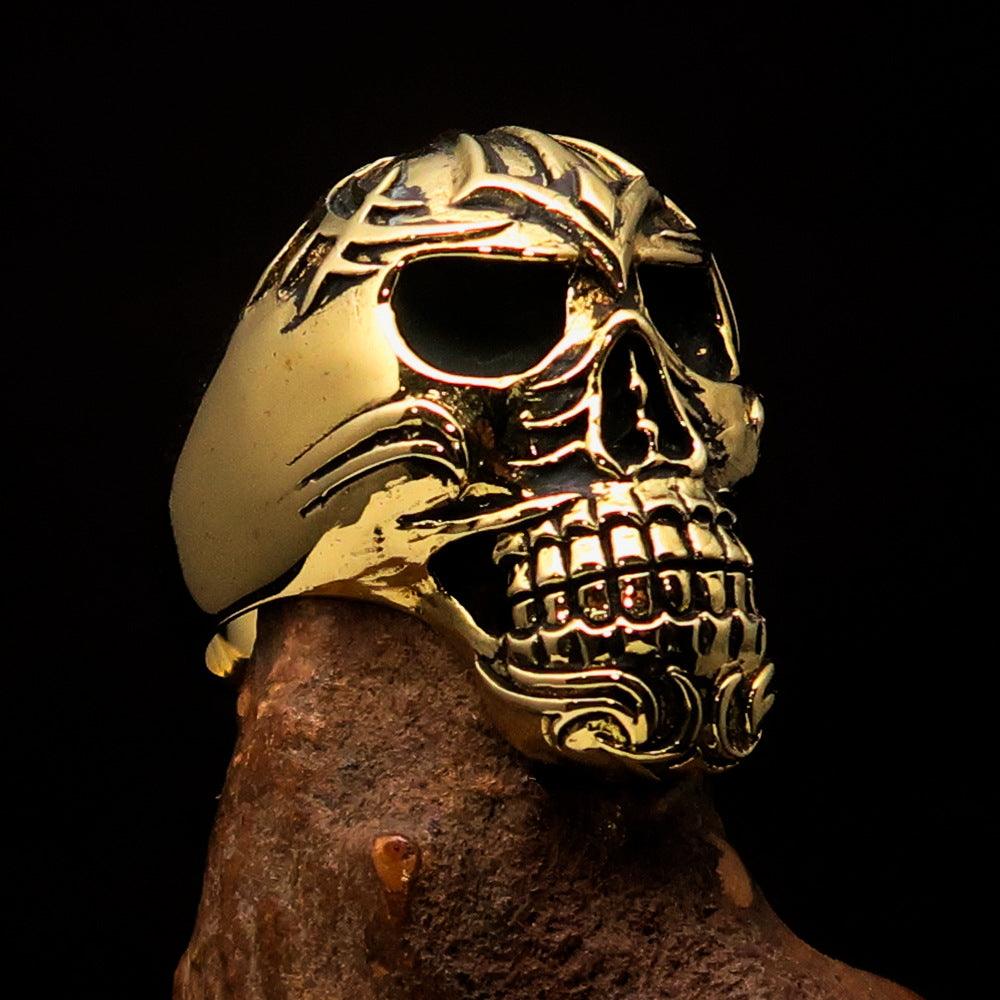 Men's Biker Tribal Skull Ring made of solid brass with a high polished and antiqued finish, showcasing intricate skull design.