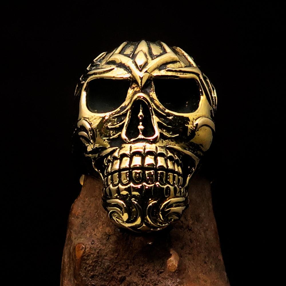 Men's Biker Tribal Skull Ring made of solid brass with a high polished and antiqued finish, showcasing intricate skull design.