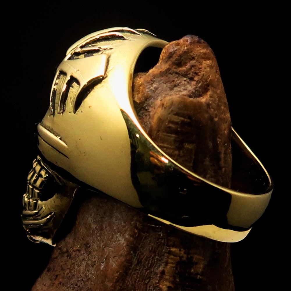 Men's Biker Tribal Skull Ring made of solid brass with a high polished and antiqued finish, showcasing intricate skull design.