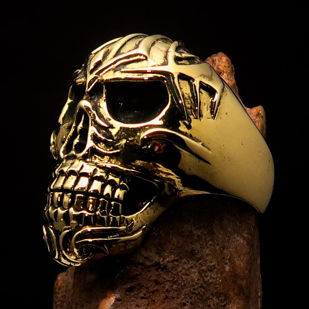 Men's Biker Tribal Skull Ring made of solid brass with a high polished and antiqued finish, showcasing intricate skull design.