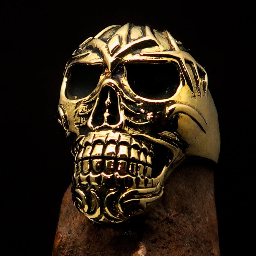 Men's Biker Tribal Skull Ring made of solid brass with a high polished and antiqued finish, showcasing intricate skull design.