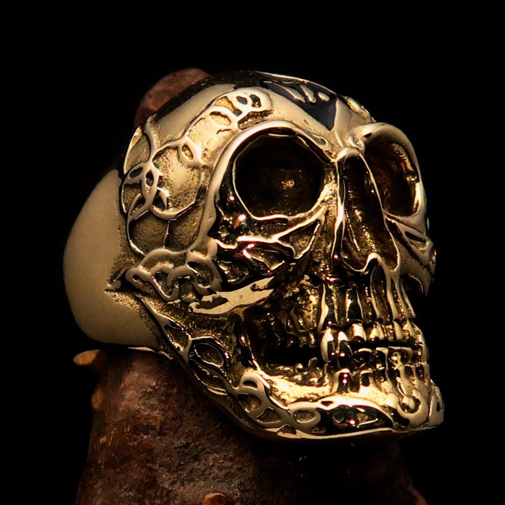 Men's black 1% Runes Skull Outlaw Biker Ring made of solid brass with a mirror polish and black enamel finish, showcasing intricate skull design.