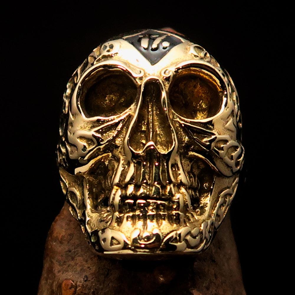 Men's black 1% Runes Skull Outlaw Biker Ring made of solid brass with a mirror polish and black enamel finish, showcasing intricate skull design.