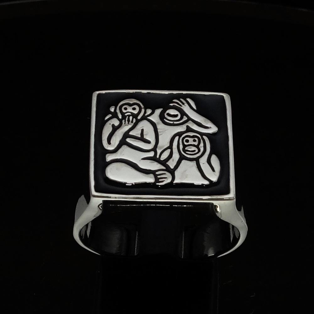 Men's black 3 Monkeys Ring made of high-quality sterling silver with a polished finish and black enamel detailing.