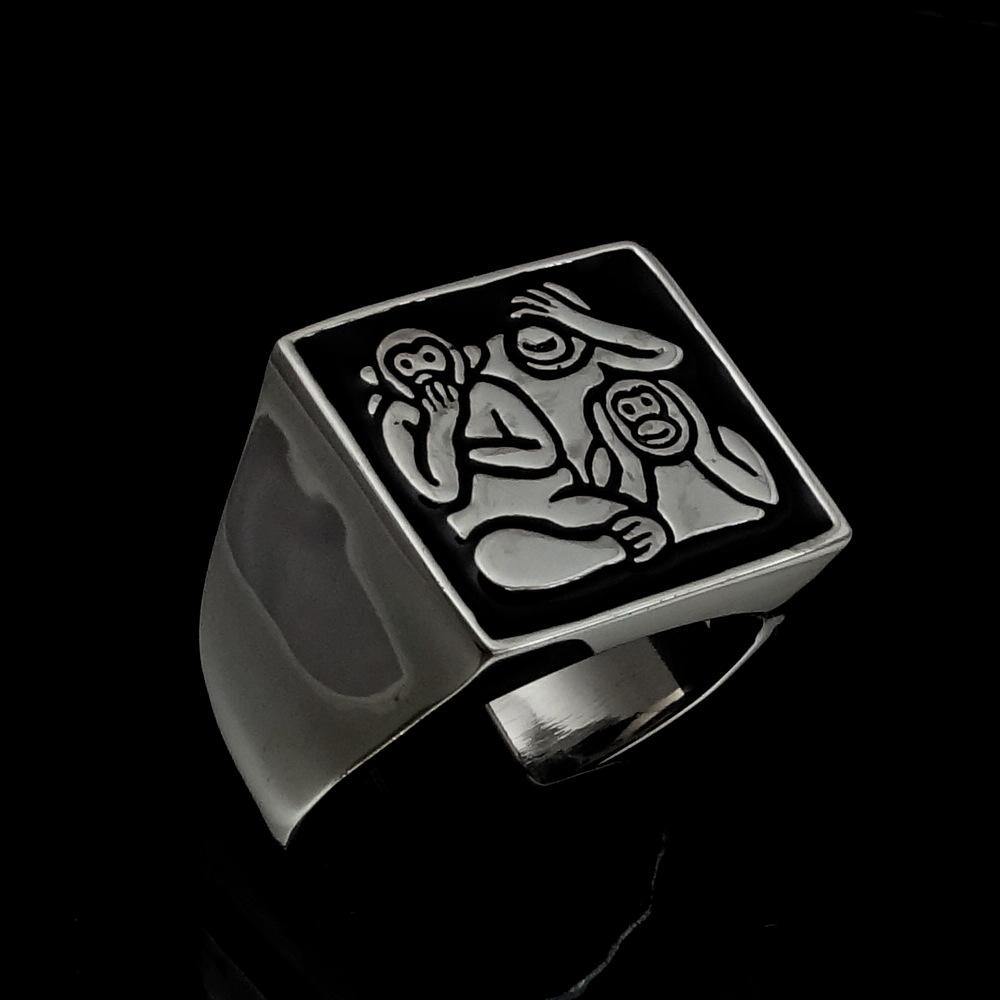 Men's black 3 Monkeys Ring made of high-quality sterling silver with a polished finish and black enamel detailing.