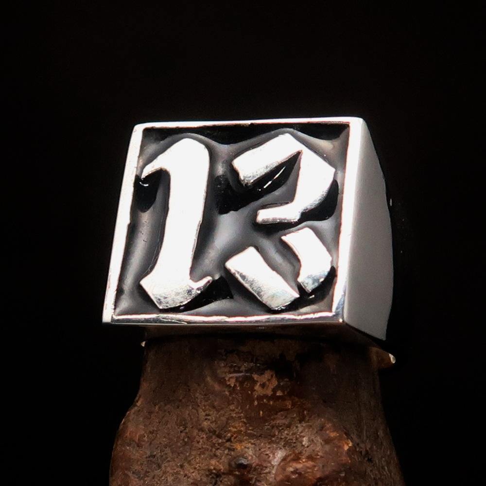 Men's black lucky number 13 ring made of sterling silver with a polished finish and black enamel inlay.