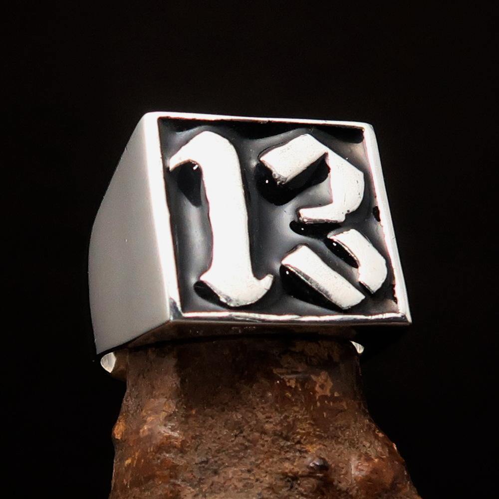 Men's black lucky number 13 ring made of sterling silver with a polished finish and black enamel inlay.