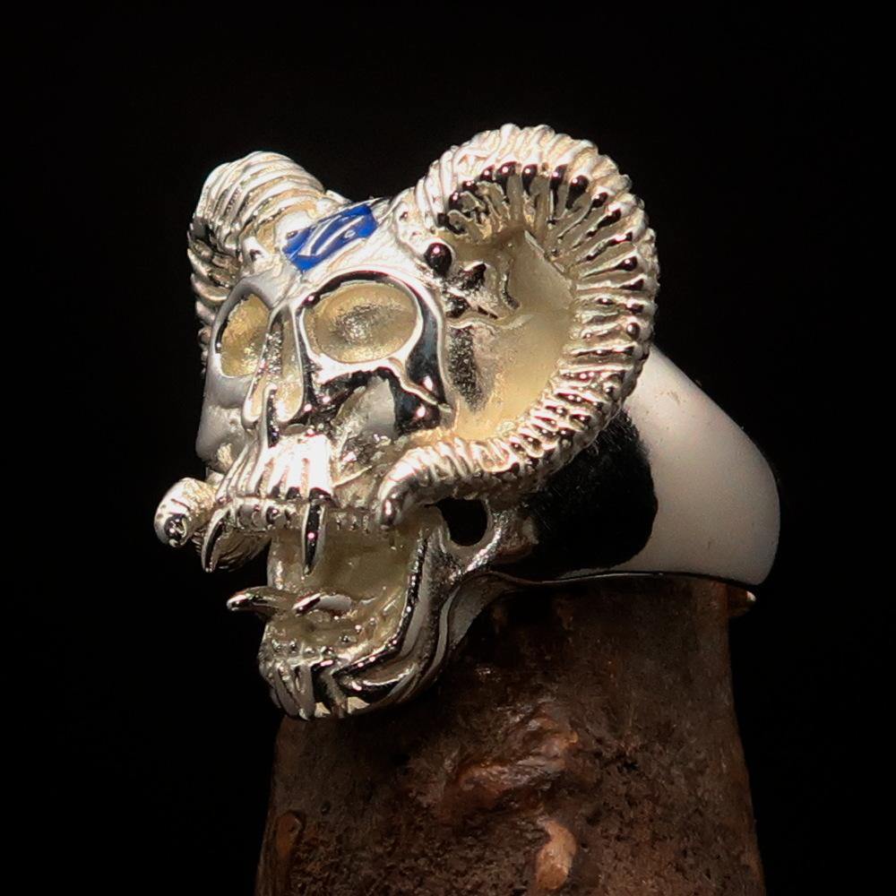 Men's blue 1% Ram Skull Outlaw Ring made of solid sterling silver with blue enamel, showcasing intricate details and a polished finish.