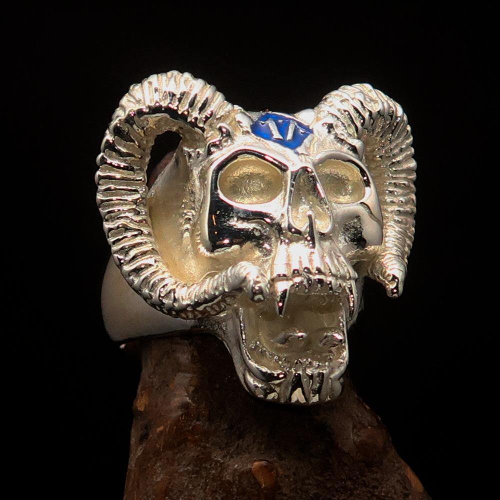 Men's blue 1% Ram Skull Outlaw Ring made of solid sterling silver with blue enamel, showcasing intricate details and a polished finish.