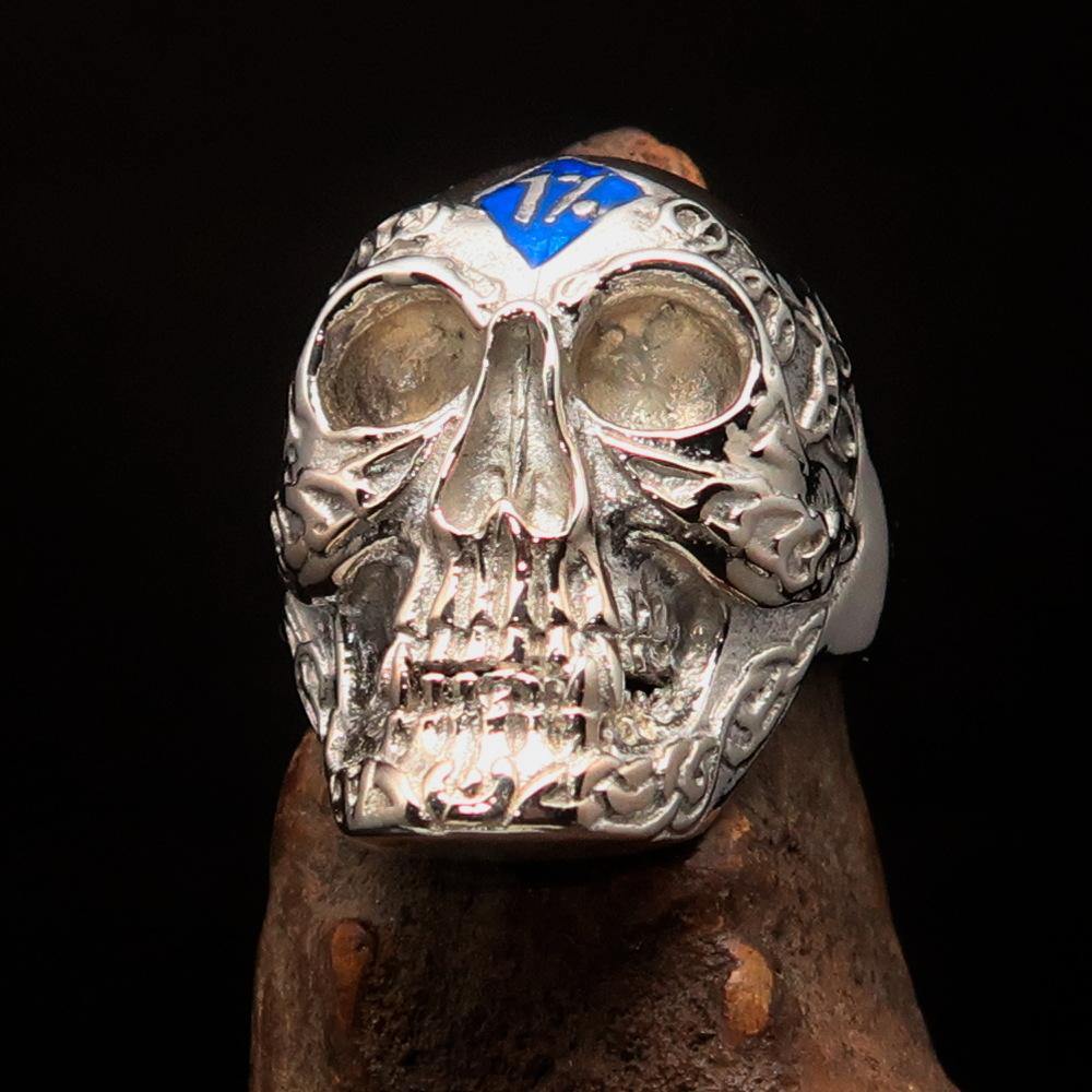 Men's blue 1% Runes Skull Outlaw Ring made of sterling silver with intricate detailing and blue enamel accents.