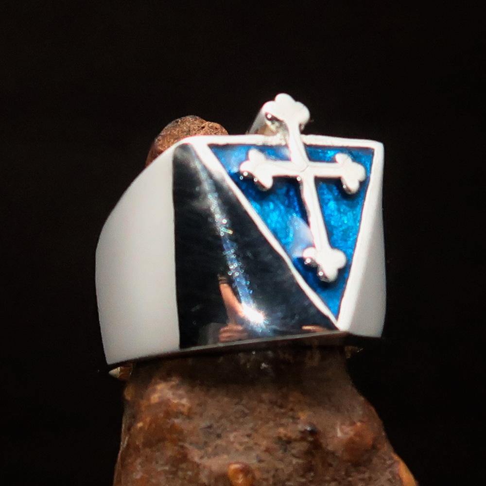 Men's Blue Coptic Cross Ring made of high polished sterling silver with blue enamel, showcasing intricate design and craftsmanship.