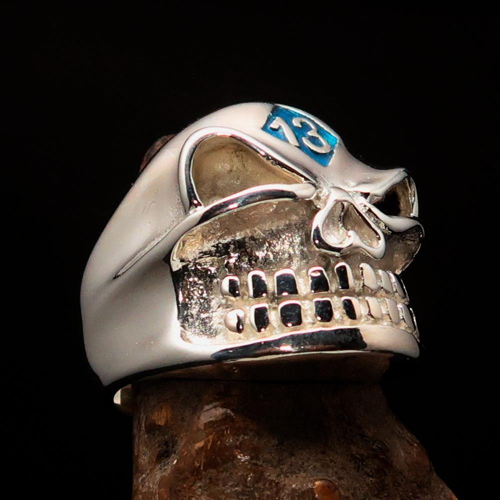 Men's blue Number 13 Gnome Skull Ring made of sterling silver with red enamel accents, showcasing a unique design.