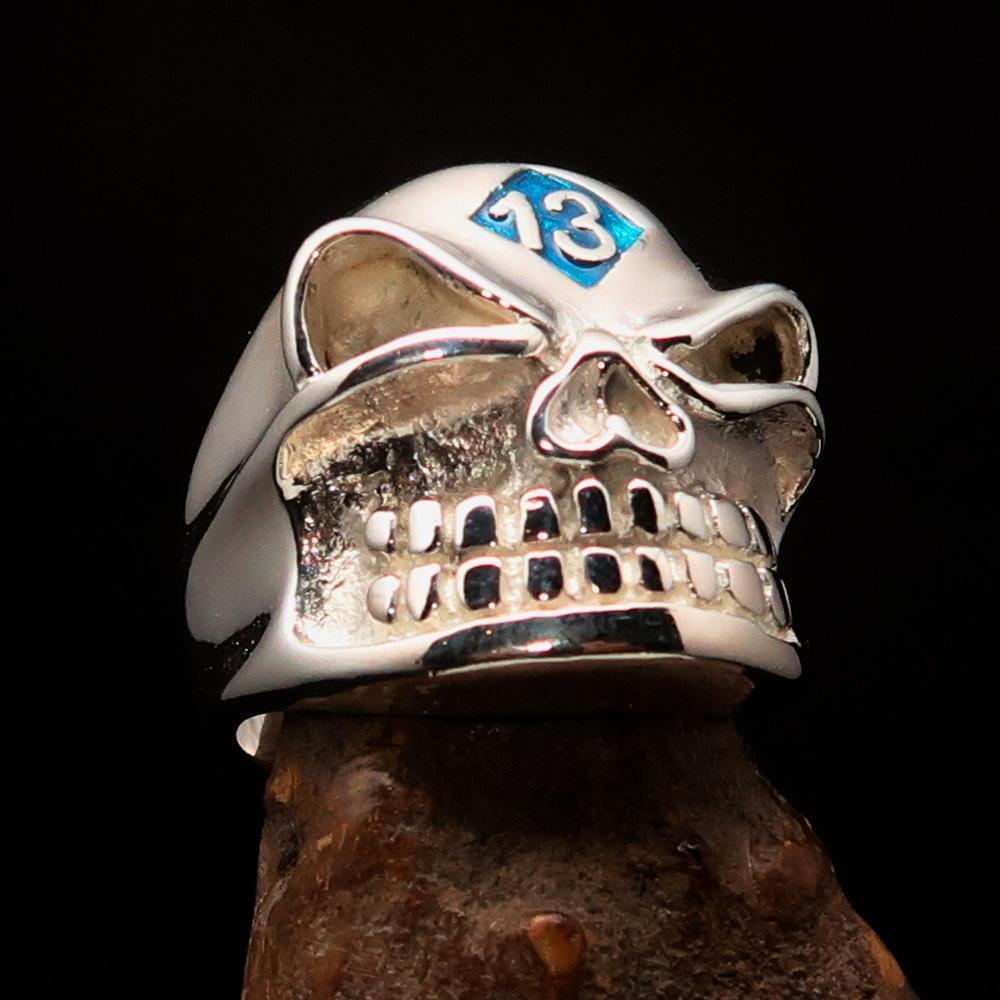 Men's blue Number 13 Gnome Skull Ring made of sterling silver with red enamel accents, showcasing a unique design.