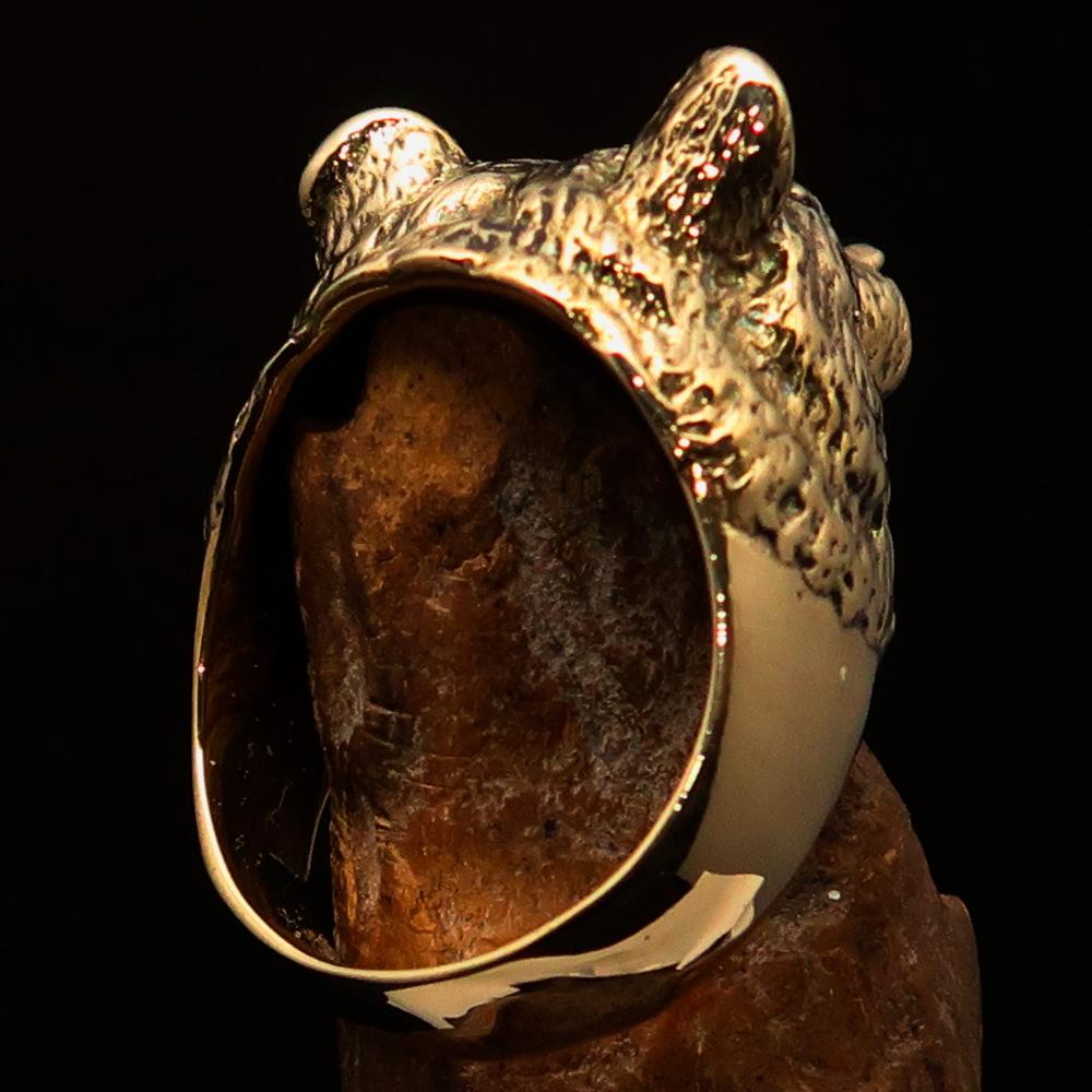 Men's brass animal ranger ring featuring a detailed grizzly bear design, showcasing a high polished and antiqued finish.