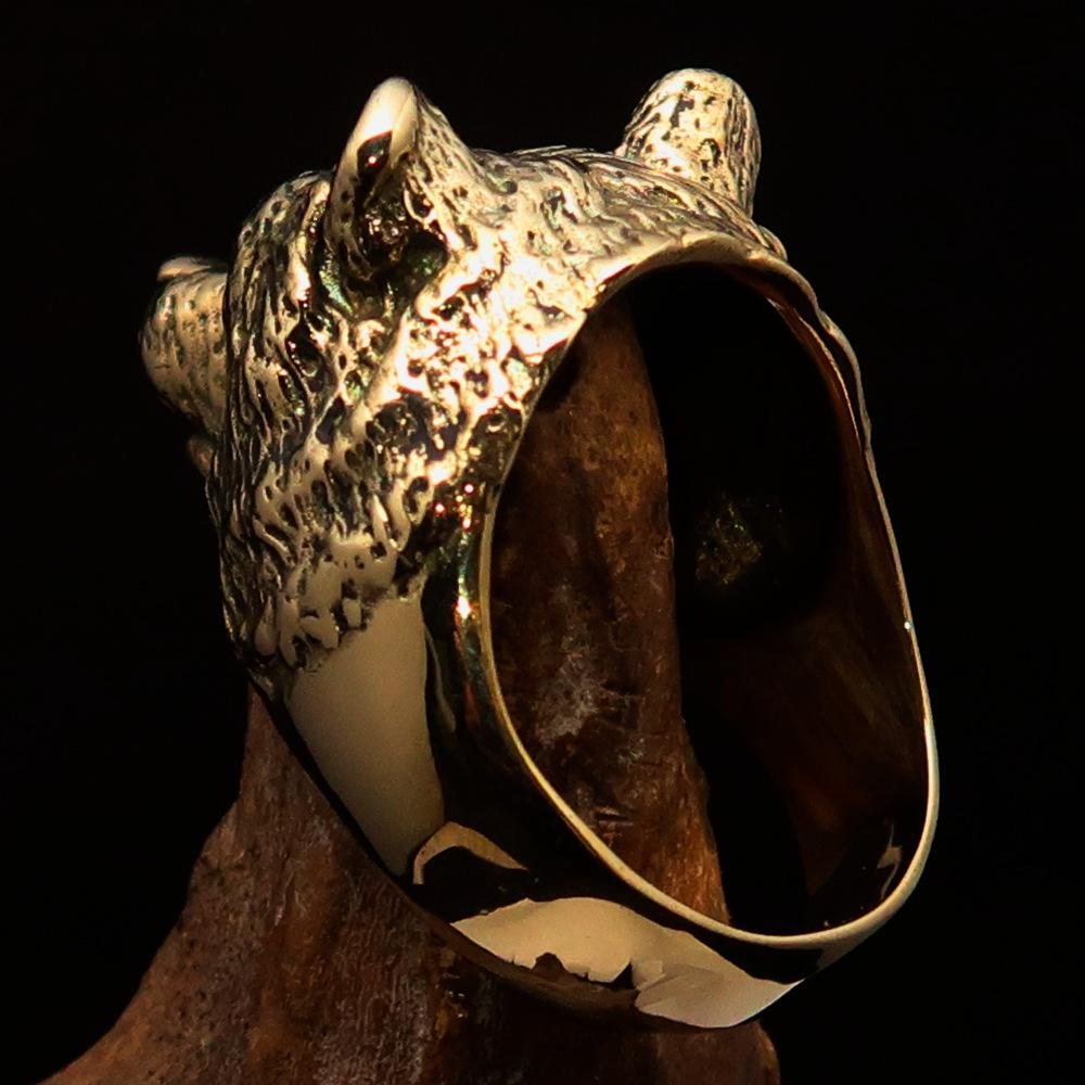 Men's brass animal ranger ring featuring a detailed grizzly bear design, showcasing a high polished and antiqued finish.