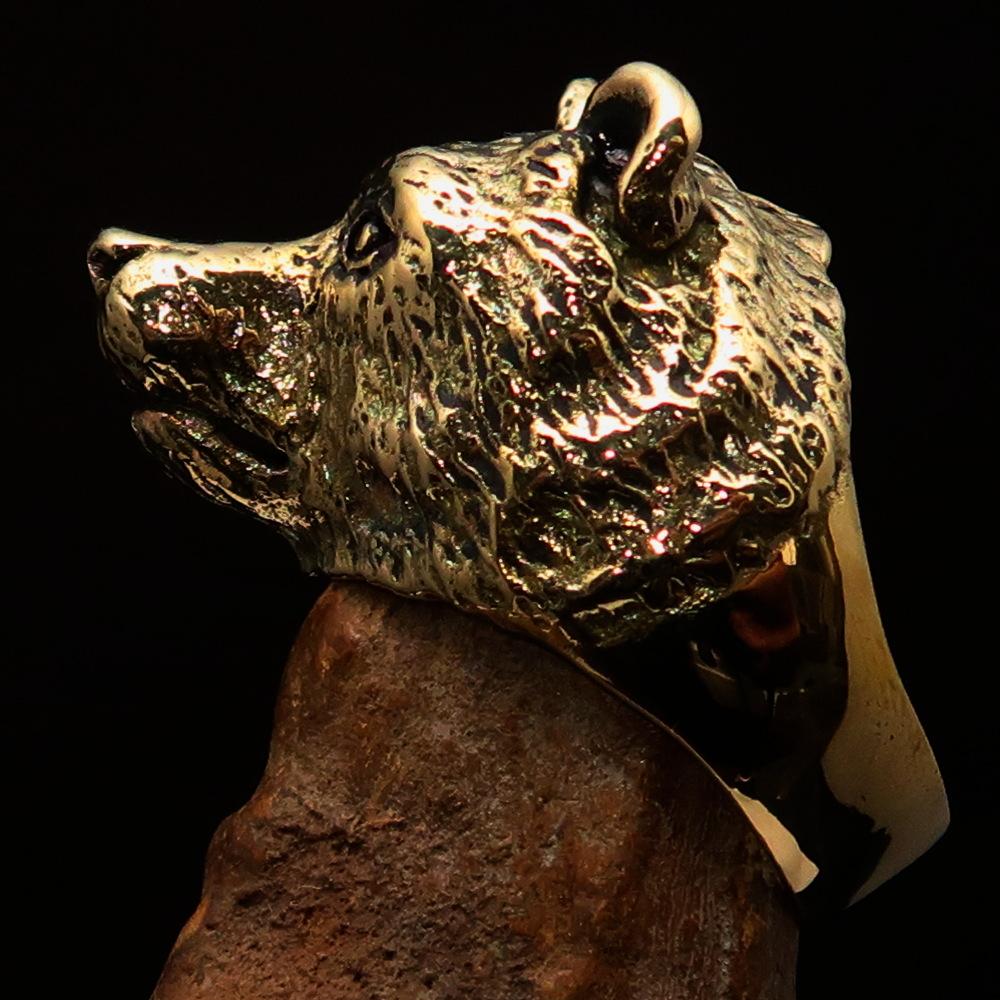 Men's brass animal ranger ring featuring a detailed grizzly bear design, showcasing a high polished and antiqued finish.