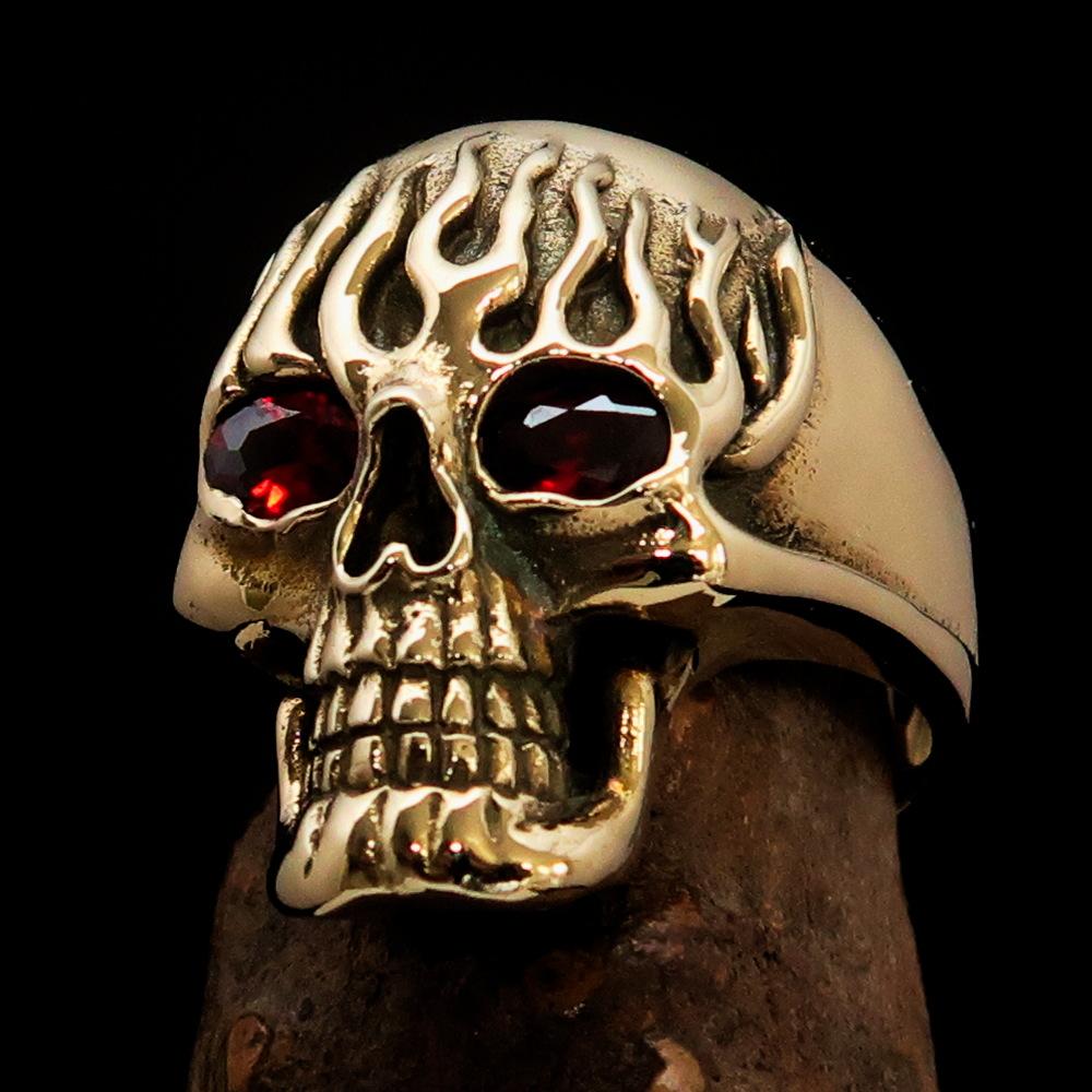 Men's Brass Biker Ring featuring a flaming skull design with red cubic zirconia, showcasing intricate details and a high polish finish.