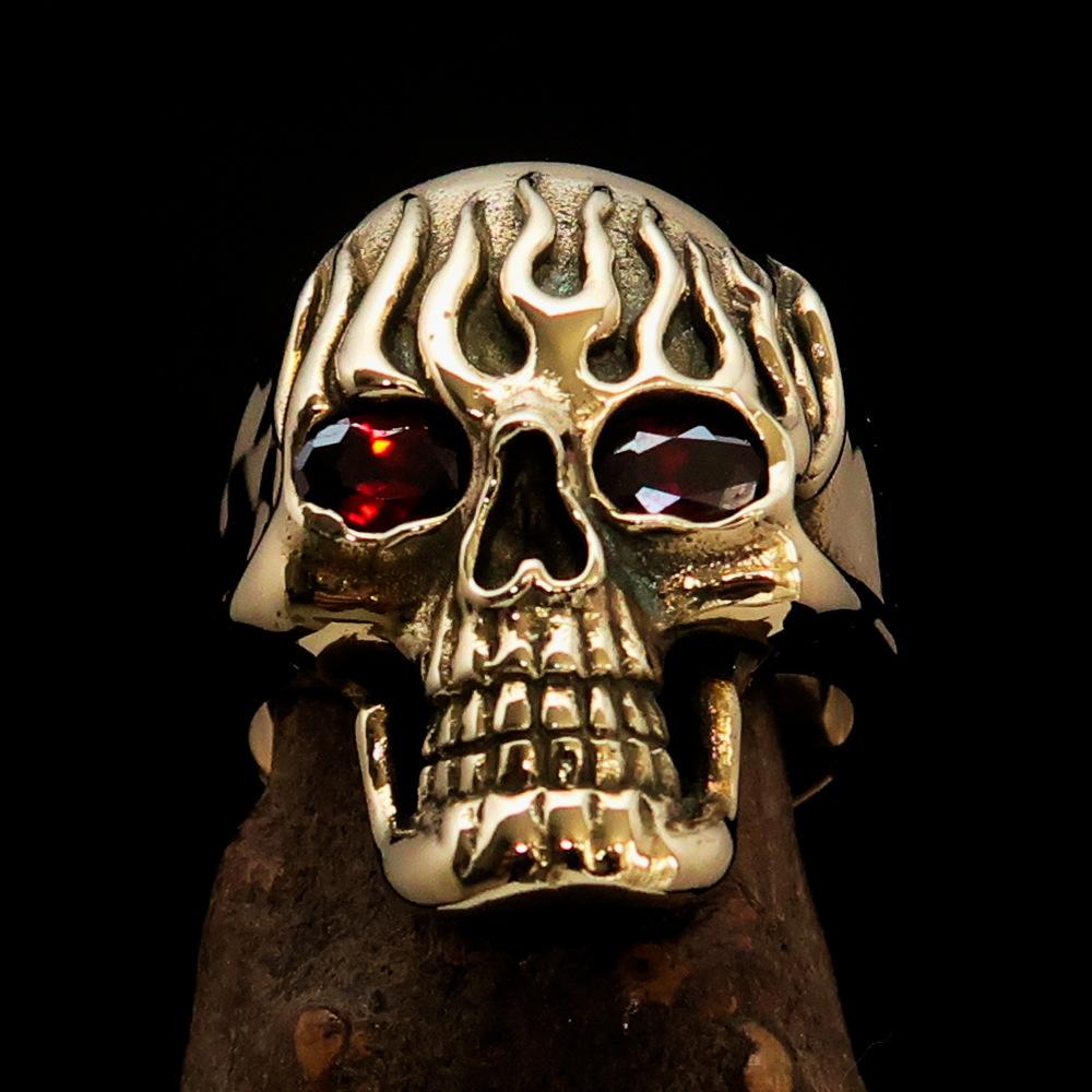 Men's Brass Biker Ring featuring a flaming skull design with red cubic zirconia, showcasing intricate details and a high polish finish.