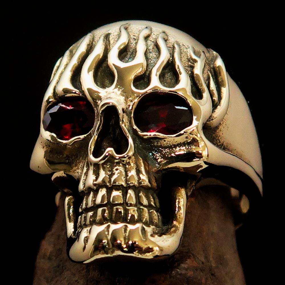 Men's Brass Biker Ring featuring a flaming skull design with red cubic zirconia, showcasing intricate details and a high polish finish.