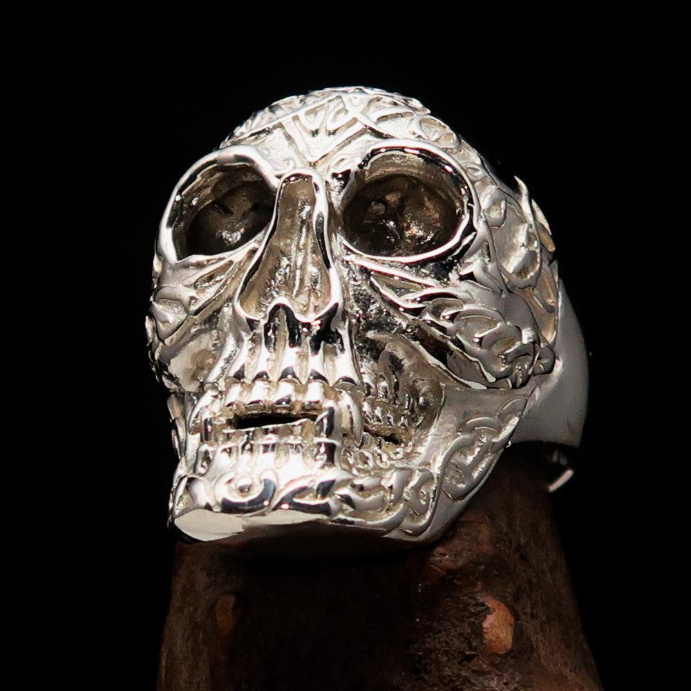 Men's Celtic Skull Ring in sterling silver with a mirror polish finish, showcasing intricate design and quality craftsmanship.